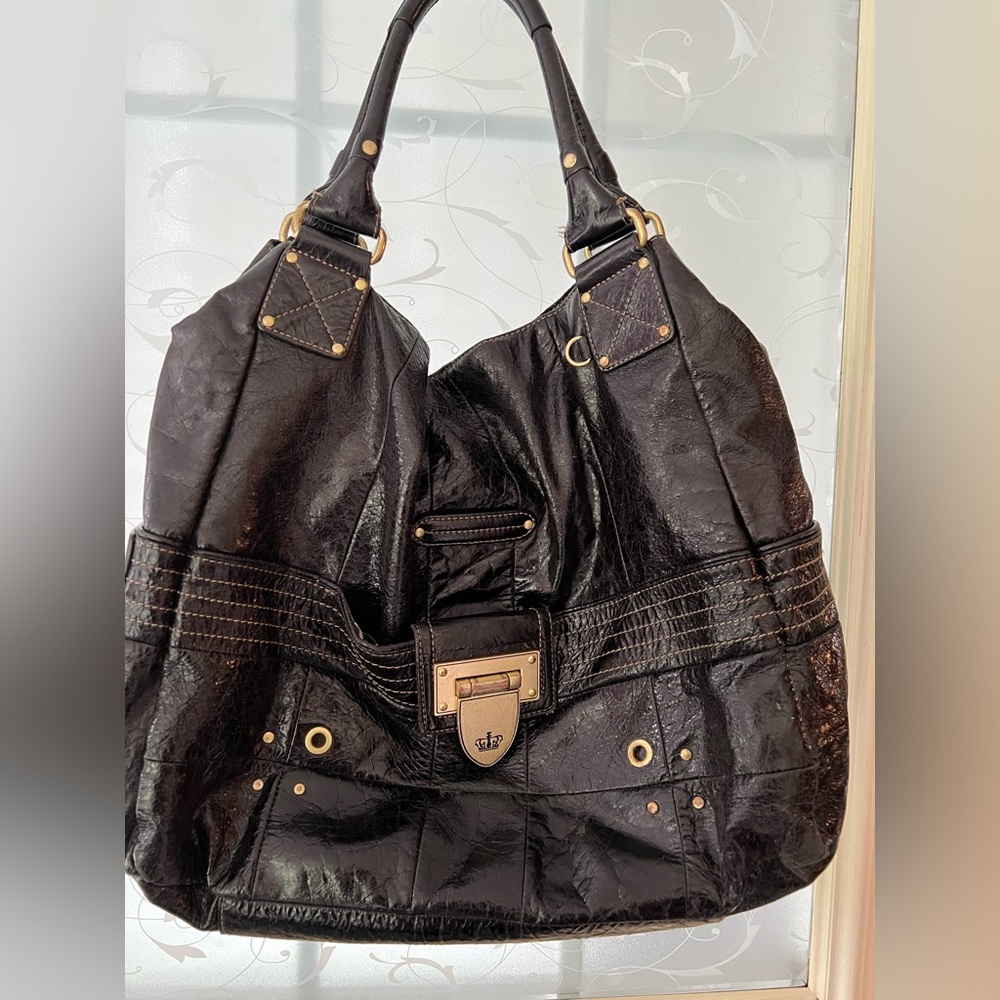Juicy Couture black patent leather shoulder tote bag. Gold hardware.